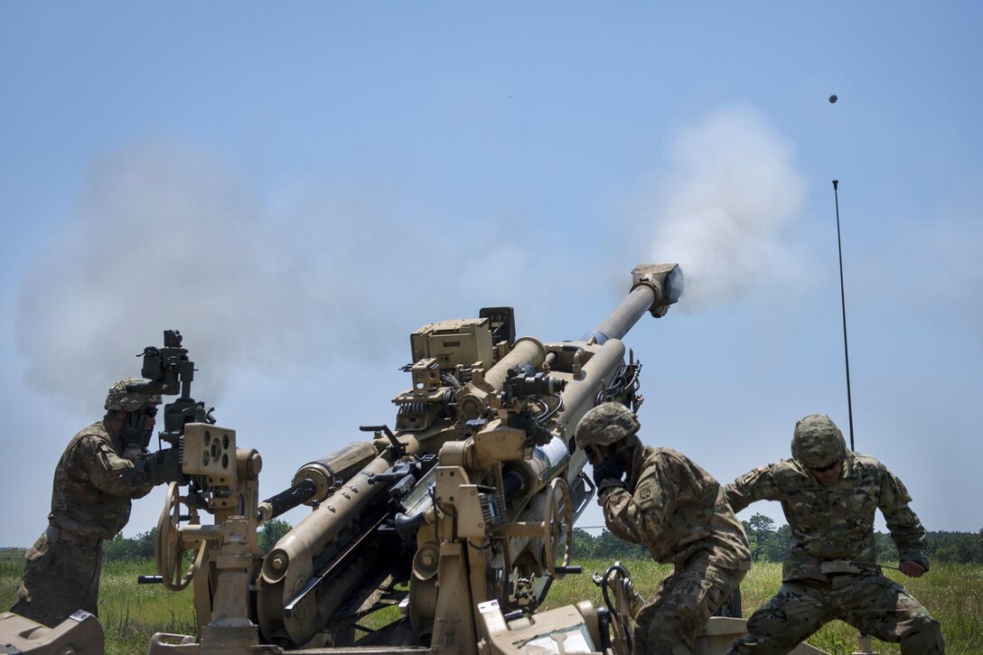 Soldiers fire an M777A2 howitzer during exercise Crescent Reach 16 at Fort Bragg, N.C., May 26, 2016. Air Force photo by Airman 1st Class Sean Carnes