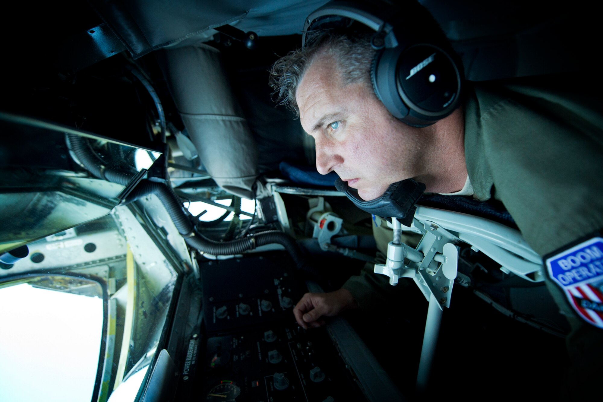 Master Sgt. Mike Morgan, 434th Air Refueling Wing boom operator, from Grissom Air Reserve Base, Indiana, operates the boom to refuel a Polish F-16 during Baltic Operations 2016 at Powidz Air Base, Poland, June 6, 2016. Deployed forces will work in tandem with naval forces to enhance flexibility and interoperability with participating NATO allies and partner nations by conducting a series of realistic, combined flying training including air defense, maritime awareness and support to amphibious operations. (U.S. Air Force photo/Senior Airman Erin Babis)