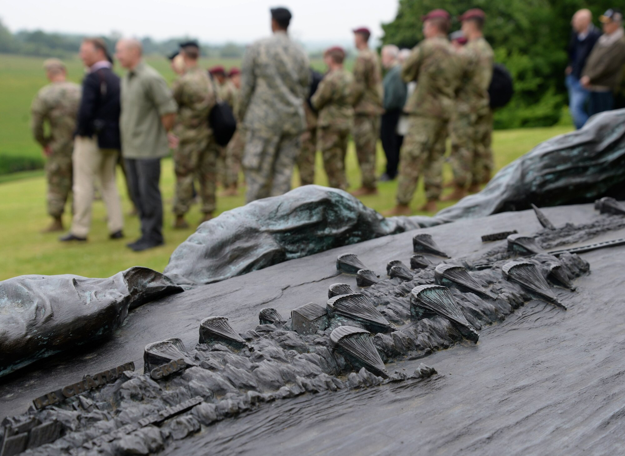 Military members from NATO allied nations visit Memorial Park la Fiere, June 4, 2016 in Sainte-Mère-Église, France. Memorial Park is dedicated to airborne troops that lost their lives during the airdrops on D-Day. During World War II, the Battle of Normandy began on D-Day, June 6, 1944, when approximately 156,000 American, British and Canadian forces landed on five beaches along a 50-mile stretch of the coast of France’s Normandy region. The events in honor of D-Day, June 3 to 6, 2016, were held in cities throughout Normandy and were open to all guests. (U.S. Air Force photo by Senior Airman Justine Rho/Released)