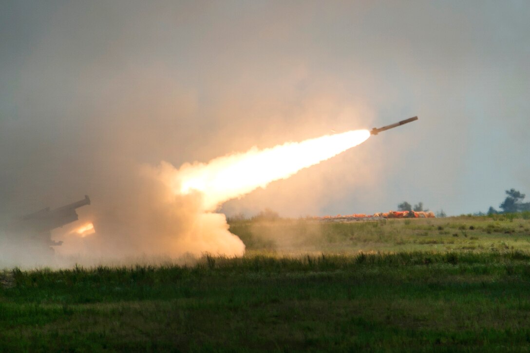 Soldiers fire a high-mobility artillery rocket during exercise Crescent Reach 16 at Fort Bragg, N.C., May 26, 2016. The soldiers are assigned to the 82nd Airborne Division’s 18th Field Artillery Brigade. Air Force photo by Airman 1st Class Sean Carnes