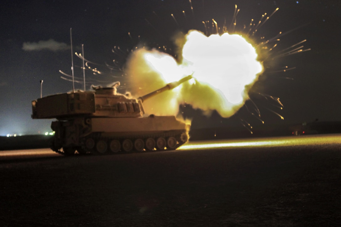 An Army Paladin M109 Alpha-6 howitzer fires an illumination round during a night live-fire in support of exercise Eager Lion 2016 in Al Zarqa, Jordan, May 23, 2016. Army photo by Spc. Kevin Kim
