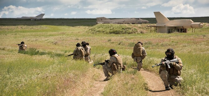 Listening Eagle exercise participants secure an area at Saylor Creek Range Complex, Idaho, May 10, 2016. The joint exercise originally began with the U.S. and the British armed forces in 2013. (U.S. Air Force photo by Airman Alaysia Berry/Released)