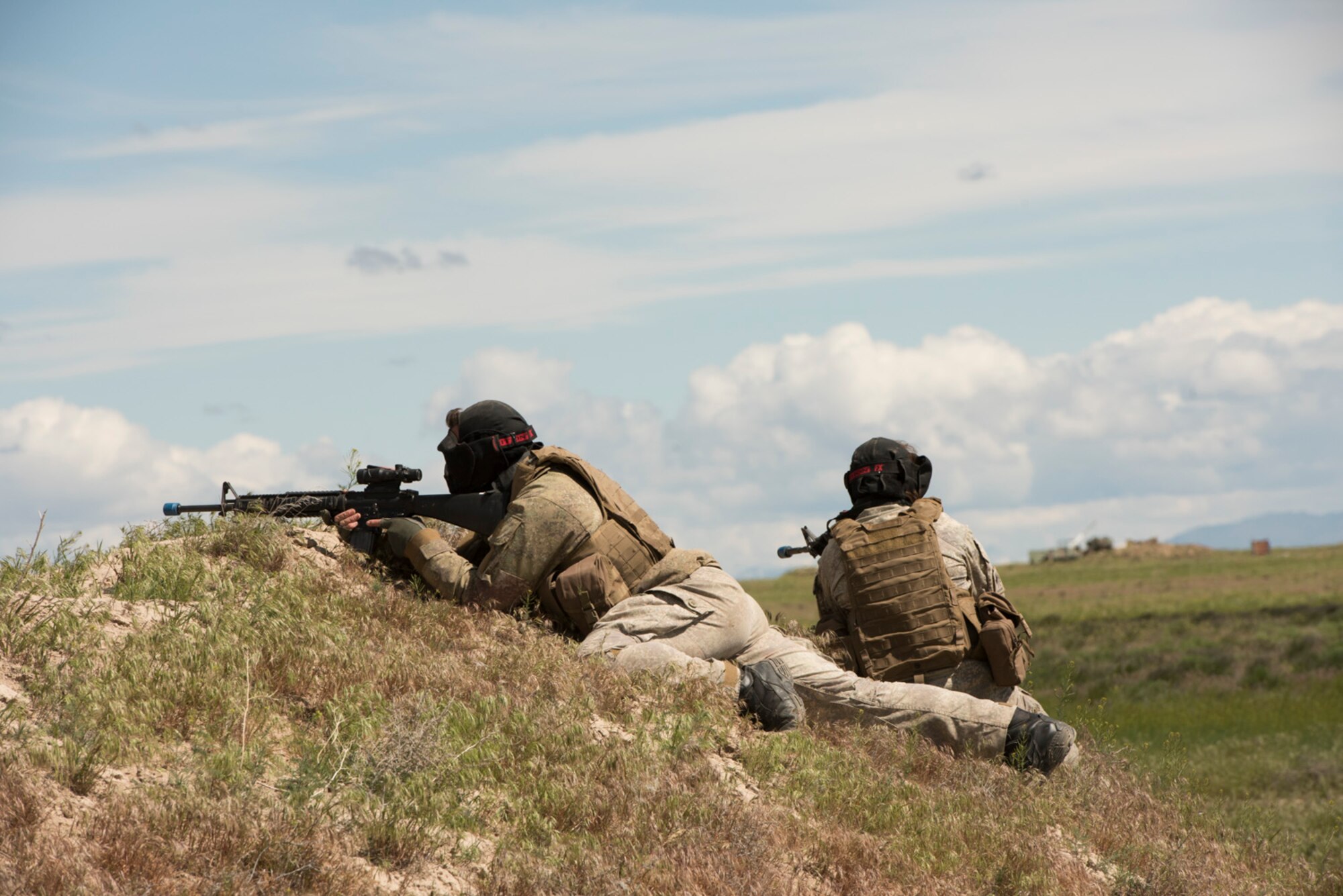 Listening Eagle exercise participants scan the area for potential threats during a training scenario at Saylor Creek Range Complex, Idaho, May 10, 2016. The tough weather patterns in Idaho helped simulate different combat enviroments to make the exercise more realistic.(U.S. Air Force photo by Airman Alaysia Berry/Released)