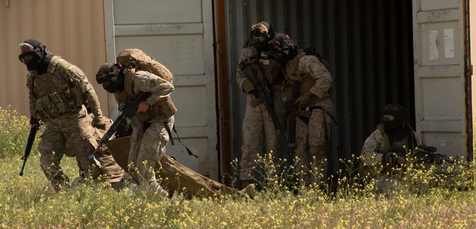 Participants of the Listening Eage exercise practice care-under-fire scenarios at Saylor Creek Range Complex, Idaho, May 10, 2016. Each nation inolved in the Listening-series exercises takes turns hosting the joint-exercise annually. (U.S. Air Force photo by Airman Alaysia Berry/Released)