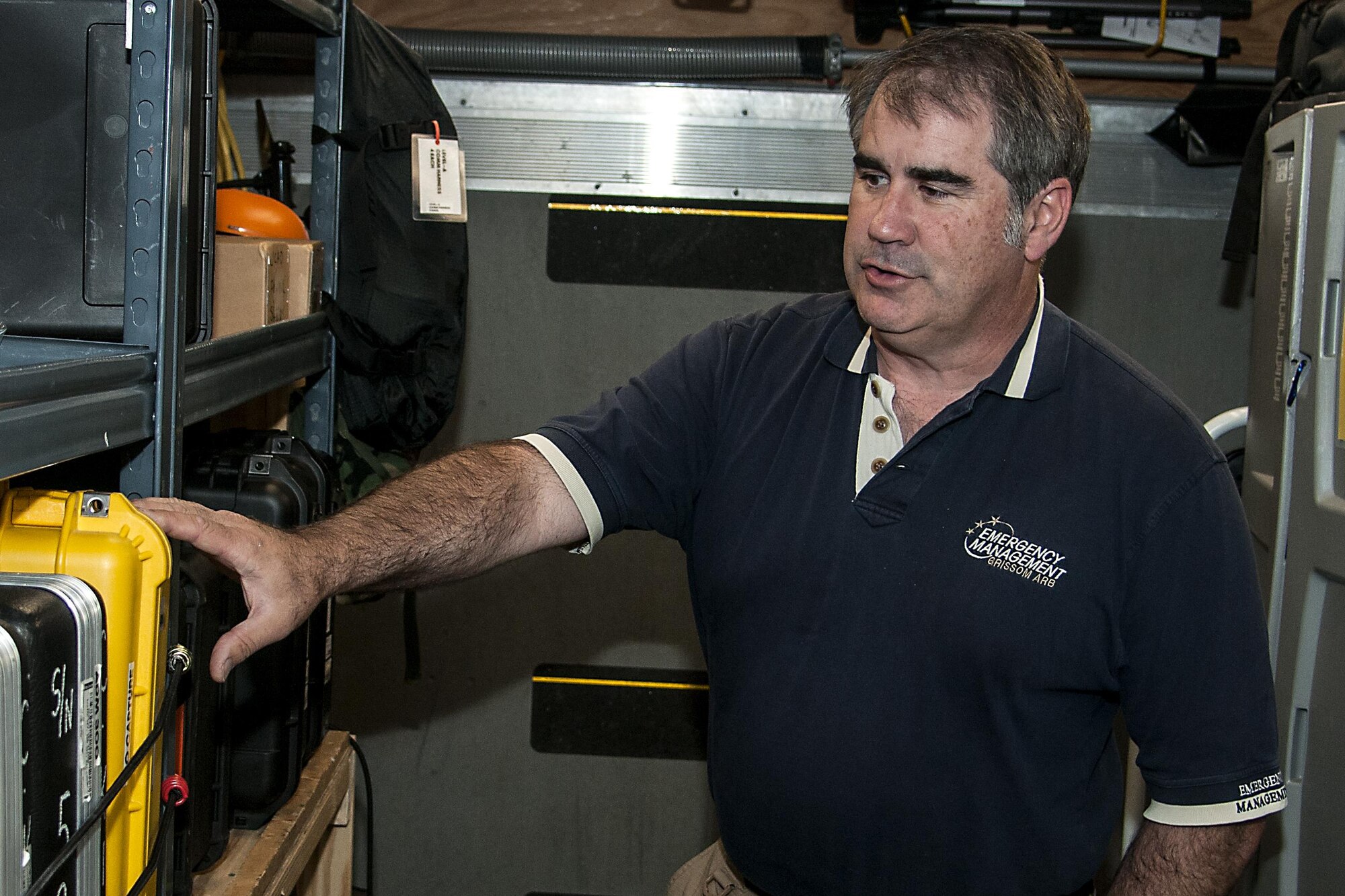 Dan DeAngulo, 434th Air Refueling Wing base emergency manager, inspects equipment in Grissom’s CBRNE response trailer June 8, 2016 at Grissom Air Reserve Base, Ind. DeAngulo received the Air Force Reserve Command’s the 2015 Emergency Manager of the Year award. (U.S. Air Force photo/Senior Airman Dakota Bergl) 