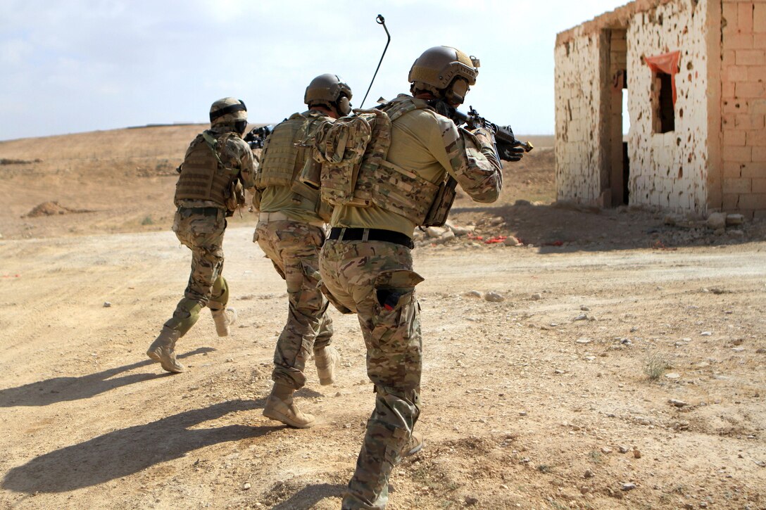U.S. and Jordanian special operations forces move toward their next objective during a simulated raid as part of exercise Eager Lion 2016 in Al Zarqa, Jordan, May 23, 2016. Army photo by Sgt. 1st Class Sean Foley