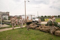 Marines with 5th platoon, Charlie Company, Fleet Anti-Terrorism Team, Marine Corps Security Force Regiment, unload gear after returning to Camp Allen, Norfolk from a seven-month deployment to Bahrain, June 6, 2016. During their deployment, the Marines conducted security operations in the United States Fifth Fleet area of operations, while training alongside other forces in Bahrain, Kuwait, Qatar and Jordan. Along with providing support for their mission, the Marines engaged in training evolutions such as fire team competitions, professional military education and weapon system ranges. (Official Marine Corps photo by Cpl. Calvin Shamoon/ Released)