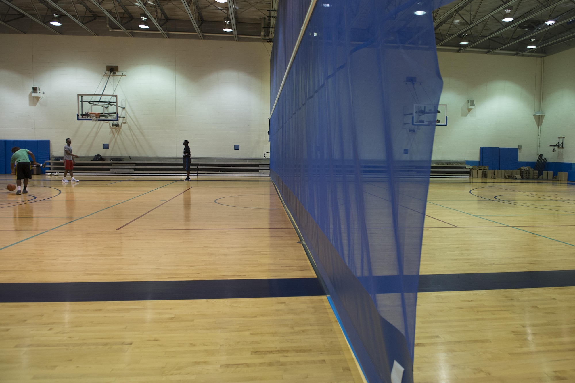 James Sports Center recently acquired a gym divider to host more activities at once for frequent customers. Along with the James Sports Center, the Fitness Center is undergoing renovations including upgrades to plumbing, flooring, and the HVAC system. Renovations are projected to be completed by this fall. (U.S. Air Force photo/ Senior Airman Kiana Brothers)