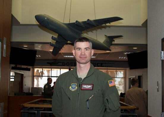 Staff Sgt. Matthew Larson, 22nd Airlift Squadron loadmaster, poses for a portrait photo at Travis Air Force Base, Calif., May 16, 2016. (U.S. Air Force photo by T.C. Perkins Jr.)