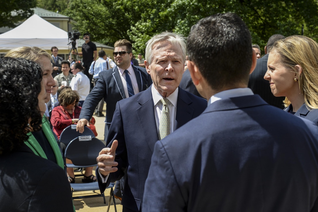 Navy Secretary Ray Mabus greets members of the audience during the Defense Department's LGBT Pride Month celebration at the Pentagon, June 8, 2016. The event enables the defense community to come together and acknowledge the diversity of the American people in a festive, affirming atmosphere. DoD photo by Marvin D. Lynchard