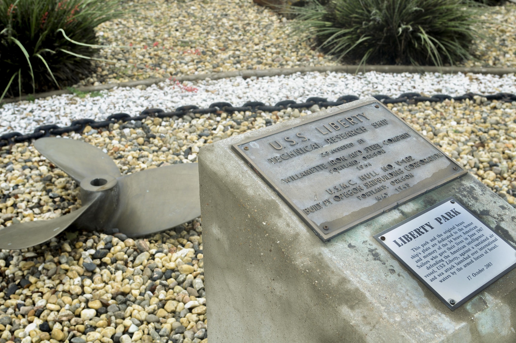 The dedication plaque and propeller are displayed at Liberty Memorial Park on Goodfellow Air Force Base, Texas, June 3, 2016. The park was dedicated in 2003 to honor the memory of the 34 brave American Sailors who gave their lives June 1967 defending the American intelligence vessel against a sustained air and sea attack launched over international waters by the Armed Forces of Israel. (U.S. Air Force photo by 2nd Lt Tisha Wilkerson/Released)