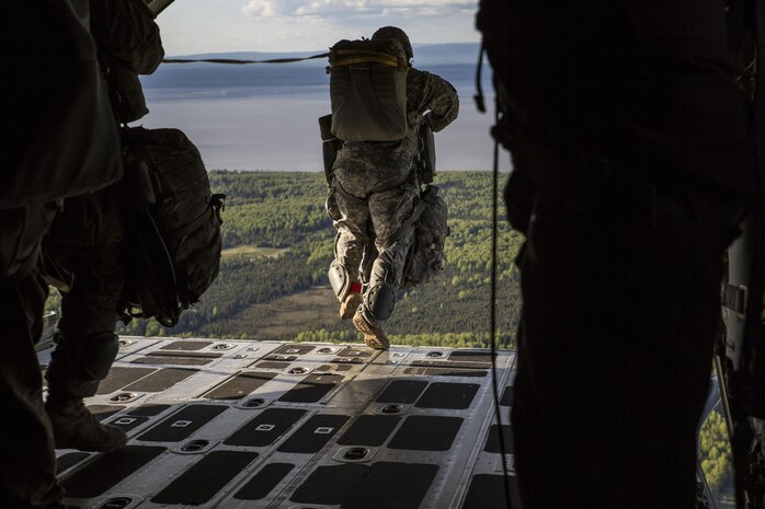 A U.S. Army soldier jumps from the cargo bay of a  Marine Aerial Refueler Transport Squadron 152 KC-130J Super Hercules during exercise Kodiak Mace at Joint Base Elmendorf-Richardson, Alaska, May 25, 2016. The squadron traveled from Marine Corps Air Station Iwakuni, Japan to train with the 4th Infantry Brigade Combat Team, 25th Infantry Division in Alaska to support the exercise. Kodiak Mace is an annual joint exercise designed to give the U.S. Marines and the U.S. Army training time to enhance cohesion and mission readiness. (U.S. Marine Corps photo by Cpl. Cory Schubert/Released)