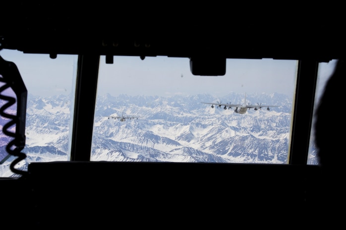 A detachment of KC-130J Super Hercules aircraft from Marine Aerial Refueler Transport Squadron 152, homestationed at Marine Corps Air Station Iwakuni, Japan, conduct low altitude training during exercise Kodiak Mace, May 28, 2016. The squadron trained at Joint Base Elmendorf-Richardson, Alaska, in support of exercise Kodiak Mace, which is an annual joint exercise designed to give the U.S. Marine pilots of VMGR-152 an opportunity to conduct low altitude training in an unfamiliar environment to enhance their technical skills and operational capabilities. (U.S. Marine Corps photo by Cpl. Cory Schubert/Released)