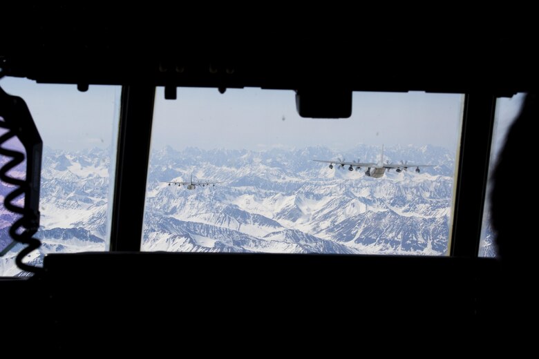 A detachment of KC-130J Super Hercules aircraft from Marine Aerial Refueler Transport Squadron 152, homestationed at Marine Corps Air Station Iwakuni, Japan, conduct low altitude training during exercise Kodiak Mace, May 28, 2016. The squadron trained at Joint Base Elmendorf-Richardson, Alaska, in support of exercise Kodiak Mace, which is an annual joint exercise designed to give the U.S. Marine pilots of VMGR-152 an opportunity to conduct low altitude training in an unfamiliar environment to enhance their technical skills and operational capabilities. (U.S. Marine Corps photo by Cpl. Cory Schubert/Released)
