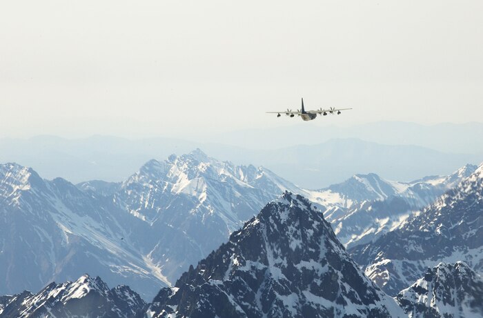 A KC-130J Super Hercules from Marine Aerial Refueler Transport Squadron 152, homestationed at Marine Corps Air Station Iwakuni, Japan, conducts tactical navigation missions during exercise Kodiak Mace, May 28, 2016. The squadron trained at Joint Base Elmendorf-Richardson, Alaska, in support of exercise Kodiak Mace, which is an annual joint exercise designed to give the U.S. Marine pilots of VMGR-152 an opportunity to conduct training in an unfamiliar environment to enhance their technical skills and operational capabilities. (U.S. Marine Corps photo by Cpl. Cory Schubert/Released)