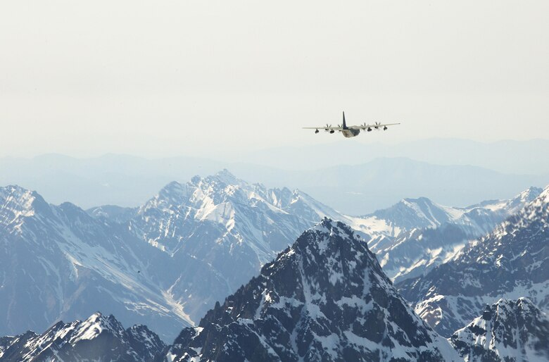 A KC-130J Super Hercules from Marine Aerial Refueler Transport Squadron 152, homestationed at Marine Corps Air Station Iwakuni, Japan, conducts tactical navigation missions during exercise Kodiak Mace, May 28, 2016. The squadron trained at Joint Base Elmendorf-Richardson, Alaska, in support of exercise Kodiak Mace, which is an annual joint exercise designed to give the U.S. Marine pilots of VMGR-152 an opportunity to conduct training in an unfamiliar environment to enhance their technical skills and operational capabilities. (U.S. Marine Corps photo by Cpl. Cory Schubert/Released)
