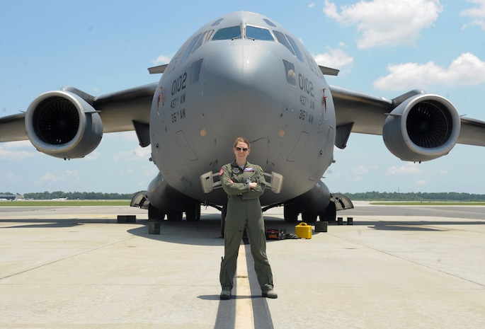 U.S. Air Force Capt. Rachael DeRoche, a pilot from the 15th Airlift Squadron, poses for a photo in front of a C-17 Globemaster III June 3, 2016, at Joint Base Charleston, S.C. DeRoche and her flight crew took on an additional mission to transport a patient from Tegucigalpa, Honduras to Tampa General Hospital May 19, 2016. (U.S Air Force photo/Airman 1st Class Kevin West)