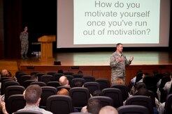 Col. Robert Lyman, Joint Base Charleston commander, responds to Airmen’s questions during a commander’s call June 3, 2016, at the base theater on JB Charleston – Air Base, S.C. JB Charleston members used their smartphones to ask anonymous questions and Lyman answered the questions at the end of the commander’s call. For the questions he was unable to get to, Lyman responds after the commander’s call by posting the answers to the base website. (U.S. Air Force photo/Senior Airman Clayton Cupit)