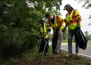 U.S. Army Sgt. 1st Class Mark Avant, Operations non-commissioned officer assigned to the 128th Aviation Brigade, his wife Beverly Avant and Don Johnson, environmental program manager and specialist assigned to the 733rd Civil Engineer Division, pick up trash and debris along the shoreline at Fort Eustis, Va., June 4, 2016. Since 1989, Clean the Bay Day has engaged over 140,000 volunteers, who have removed approximately 6.2 million pounds of debris from nearly 6,500 miles of shoreline in Virginia. (U.S. Air Force photo by Staff J.D. Strong II)