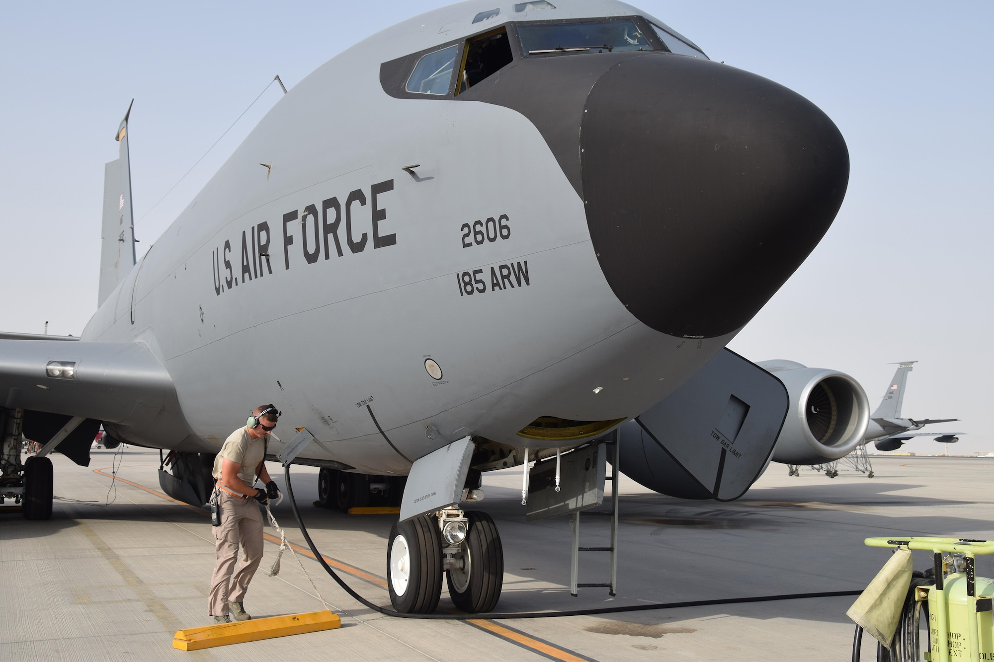 Staff Sgt. Ryan Feeney, 340th Expeditionary Aircraft Maintenance Unit crew chief, places a tire chalk in front of a KC-135 Stratotanker, tail 2606 from the Iowa Air National Guard, before an upcoming mission June 1, 2016, at Al Udeid Air Base, Qatar. Airmen from the 340th AMU conduct repairs and perform a variety of maintenance tasks to prepare the aircraft for in-air refueling missions. Feeney is attached to the 379th Air Expeditionary Wing and hails from Bangor Air National Guard Base, Maine. (U.S. Air Force photo by Technical Sgt. Carlos J. Trevino/Released)