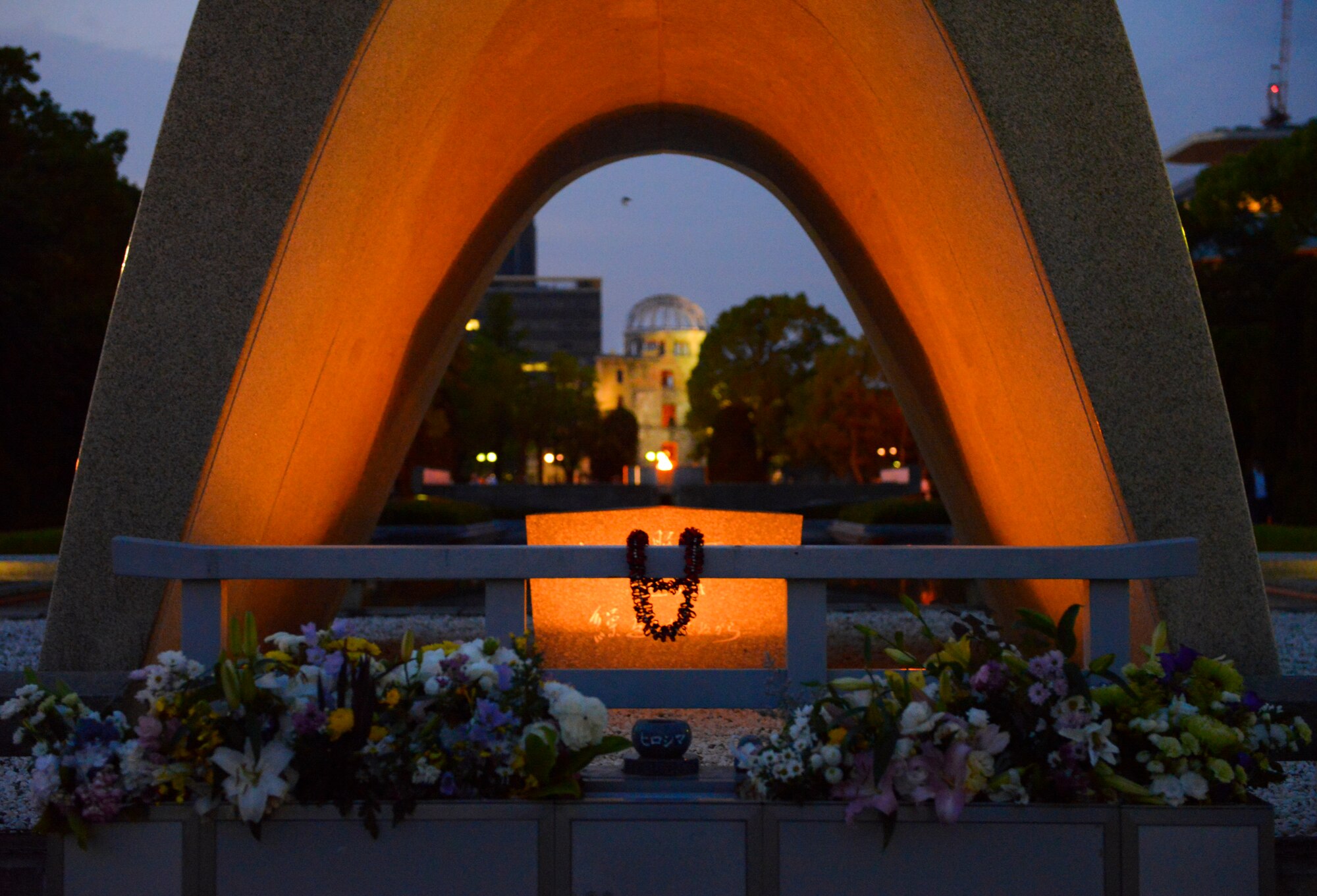 The Hiroshima Peace Memorial Monument frames the Atom-Bomb Dome at Hiroshima, Japan, May 31, 2016. The dome was preserved as a reminder of the destruction of atomic weapons in hopes that such weapons will never be used again.  (U.S. Air Force photo by Airman 1st Class Elizabeth Baker/Released)