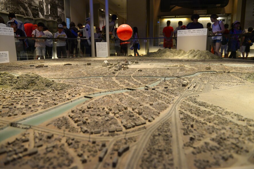 A model exhibits the detonation point and resulting destruction of the atom bomb drop at Hiroshima, Japan, June 1, 2016. The model is one of the displays at Hiroshima Peace Memorial Museum, which contains artifacts, photos and depictions to demonstrate the destruction of the bomb which the U.S. dropped on Hiroshima at the end of World War II. (U.S. Air Force photo by Airman 1st Class Elizabeth Baker/Released)