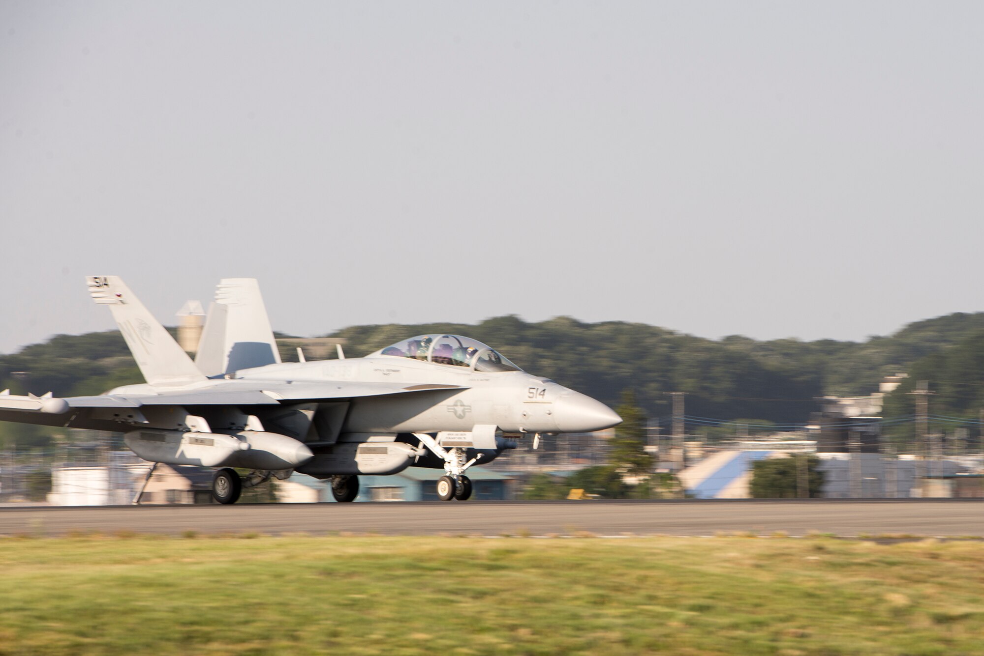 A Navy EA-18G Growler, assigned to the Electronic Attack Squadron (VAQ) 138, connects its J-Hook to an aircraft arresting system at Yokota Air Base, Japan, June 3, 2016. During an in-flight emergency, the pilot drops the J-Hook to the 1.25-inch steel cable of the AAS to assist the jet in rapidly decreasing its speed. (U.S. Air Force photo by Senior Airman David C. Danford/Released)