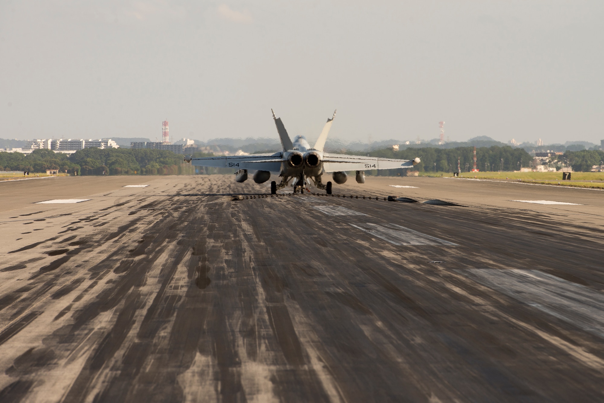 A Navy EA-18G Growler, assigned to the Electronic Attack Squadron (VAQ) 138, takes part in a test certification for the aircraft arresting system at Yokota Air Base, Japan, June 3, 2016. The certification ensures the integrity of the systems hydraulics when catching a Navy EA-18G Growler. (U.S. Air Force photo by Senior Airman David C. Danford/Released)
