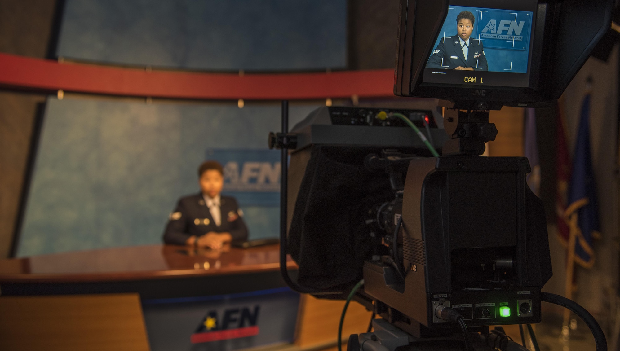 U.S. Air Force Senior Airman Candace Harris, a broadcast journalist with American Forces Network Misawa, conducts a newscast at Misawa Air Base, Japan, June 7, 2016. AFN Misawa produces a two-minute long video, called AFN Newsbreak, approximately three times a week to highlight commanders' priorities, events around base and other necessary information. The broadcast can be seen on AFN television channels, Facebook and YouTube for convenient access. Harris is from Capitol Heights, Maryland. (U.S. Air Force photo by Airman 1st Class Jordyn Fetter)