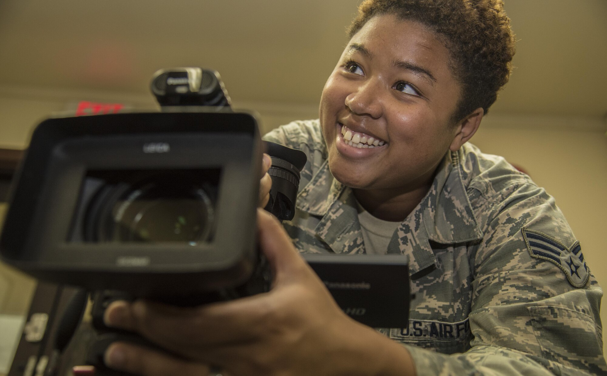 U.S. Air Force Senior Airman Candace Harris, a broadcast journalist with American Forces Network Misawa, prepares her camera for a video shoot at Misawa Air Base, Japan, June 7, 2016. AFN Airmen create weekly video stories to publicize base agencies, events and organizations, which are included in their summary video AFN Newsbreak. Not only do they broadcast the videos at a local level, but they also send them to Pacific Air Forces and Defense Media Activity to increase informational reach. Harris hails from Capitol Heights, Maryland. (U.S. Air Force photo by Airman 1st Class Jordyn Fetter)