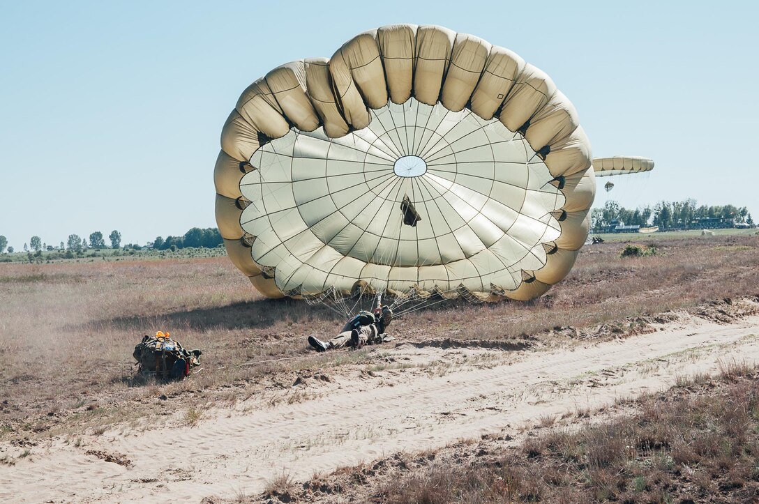 A paratrooper assigned to the 1st Brigade Combat Team, 82nd Airborne Division jumps into Torun, Poland, during Exercise Anakonda 2016, June 8. Exercise Anakonda 2016, a Polish-led, multinational exercise running from June 7-17, involves approximately 25,000 participants from more than 20 nations and is a premier training event for U.S. Army Europe.