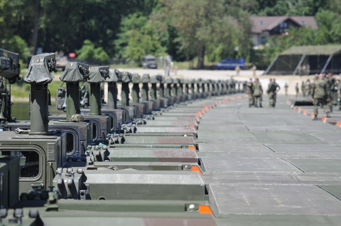 This bridge stretching the length of the Vistula River near Chelmno, Poland was created by connecting 34 U.K. and German Amphibioius Rigs together, which was then able to support 200 U.S. Army vehicles crossing, including Strykers. The multinational exercise set a new world record for building the longest Amphibious Rig vehicle bridge.  Anakonda 2016 is a Polish-led, joint multinational exercise taking place throughout Poland June 7-17. The exercise involves more than 25,000 participants from more than 20 nations. Anakonda 2016 is a premier training event for U.S. Army Europe and participating nations and demonstrates the United States and partner nations can effectively unite under a unified command while training on contemporary scenario. (U.S. Army photo by Staff Sgt. Debra Richardson (Released)