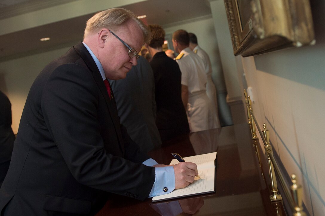 Swedish Defense Minister Peter Hultqvist signs a guest book at the Pentagon, June 8, 2016, before meeting with Deputy Defense Secretary Bob Work to discuss matters of mutual importance. DoD photo by Senior Air Force Master Sgt. Adrian Cadiz