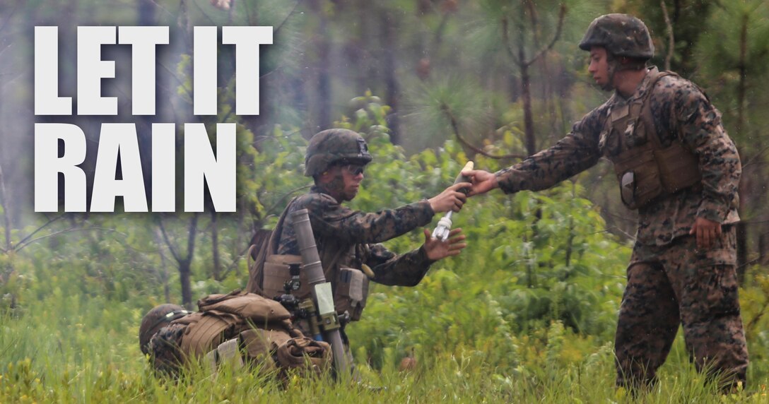 A mortarman with 1st Battalion, 2nd Marine Regiment, 2nd Marine Division, receives a primed mortar round during a training exercise at Camp Lejeune, N.C., June 6, 2016. Marines underwent mortar familiarization and proficiency training in preparation for their upcoming deployment in support of Special-Purpose Marine Air-Ground Task Force.