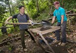 U.S. Army Maj. John Lee (left), Detachment 1 deputy commander and Capt. Philip Cooper, a team leader with the Defense POW/MIA Accounting Agency (DPAA), excavate and screen dirt in hopes of finding possible evidence during a DPAA investigation mission in Chin State, Myanmar, May 15, 2016. Cooper and eight DPAA team members deployed to the area in hopes of recovering the remains of seven U.S. Army Air Forces personnel unaccounted-for from World War II. The mission of DPAA is to provide the fullest possible accounting for our missing personnel to their families and the nation. 