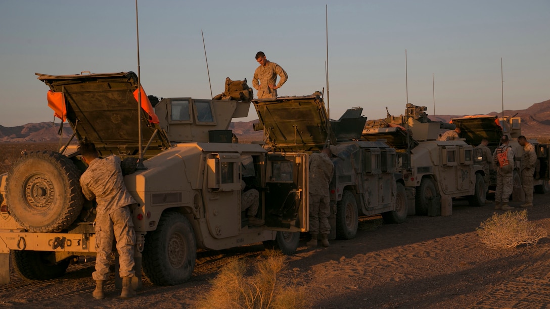 Marines with 3rd Battalion, 2nd Marine Regiment, prepare for the counterattack portion of the final exercise during the Integrated Training Exercise 3-16 in the Blacktop Training Area aboard Marine Corps Air Ground Combat Center, Twentynine Palms, California, June 3, 2016. 