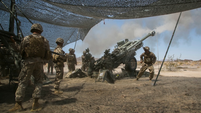 Marines with Battery C, 1st Battalion, 10th Marine Regiment, provide indirect fire with a M777 Howitzer during the final exercise of Integrated Training Exercise 3-16 in the Blacktop Training Area aboard Marine Corps Air Ground Combat Center, Twentynine Palms, California, June 1, 2016. 