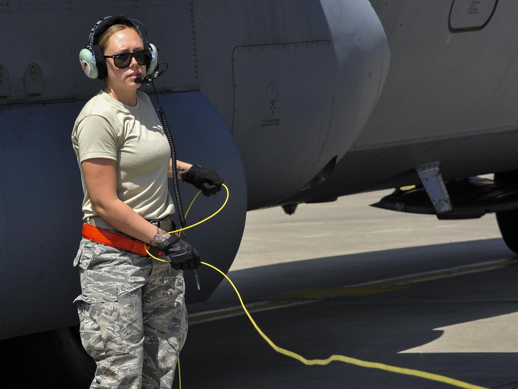 Staff Sgt. Chelsie Busbin, 317th Aircraft Maintenance Squadron flying crew chief, disconnects an aircraft and fuel truck after a refuel June 9, 2016, at Ramstein Air Base, Germany. More than 5,000 military members from 10 NATO countries are participating in this year’s annual Exercise Swift Response 2016  from May 27 through June 26. Swift Response is a joint, multinational-exercise designed to train the U.S. Global Response Force alongside high-readiness forces from Belgium, France, Germany, Italy, The Netherlands, Poland, Portugal, Spain and the United Kingdom. (U.S. Air Force photo/Senior Airman Larissa Greatwood)