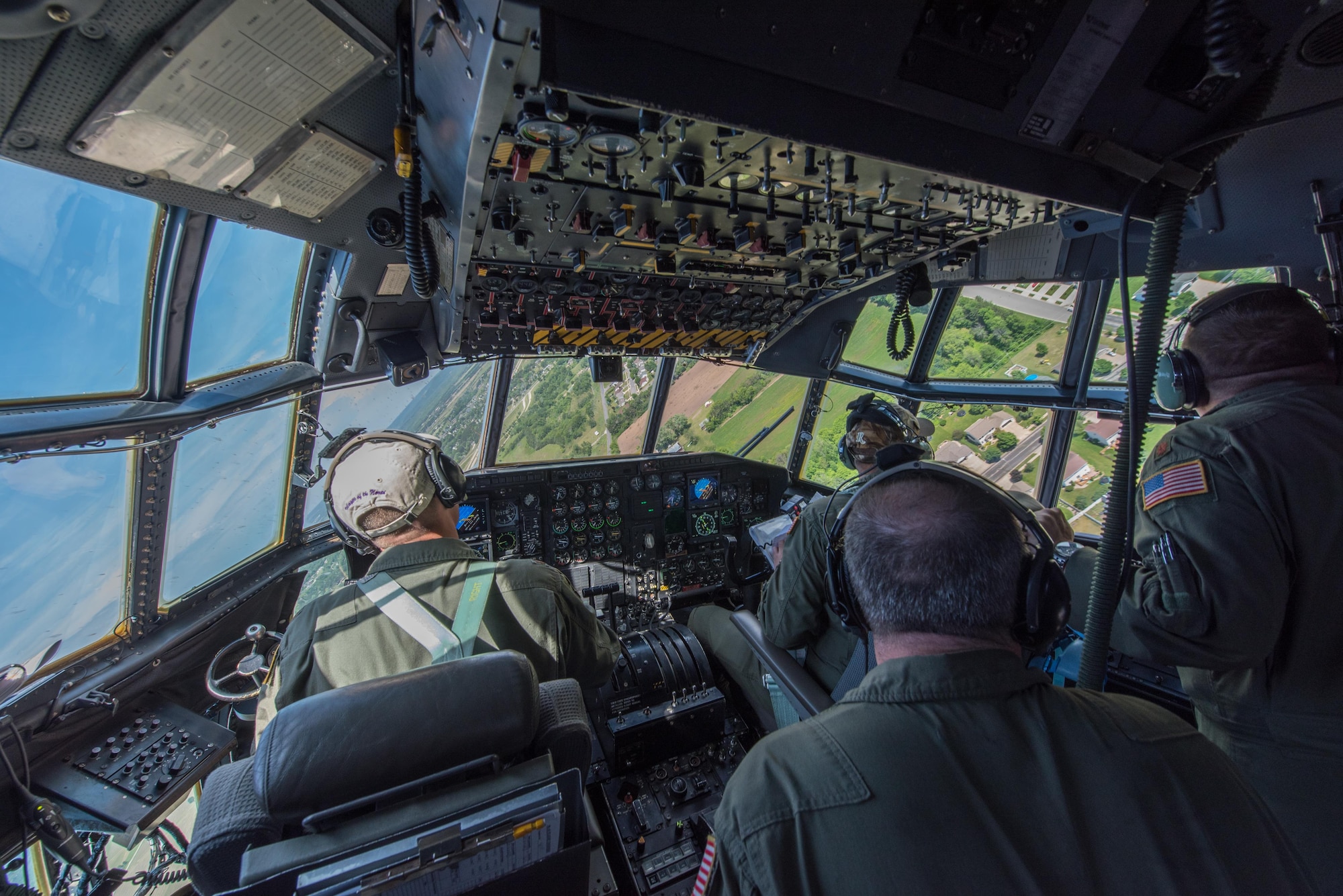 Maj. Ethan Bryant maneuvers through the course as Capt. Mike McFadden, Maj. John Johnston and Master Sgt. Quentin Will scan the area for the next objective.  (U.S. Air Force photo by Master Sgt. Eric Amidon)
