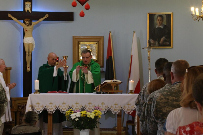 SZCZECIN, Poland—U.S. Army National Guard Maj. Patrick Paul Brownell, the Chaplain for the 230th Sustainment Brigade, Chattanooga, Tenn., preaches to a Polish congregation during NATO training exercise Anaconda 16 on June 6. Brownell was invited by Polish Army Chaplain, Capt. Thomasz Szeflinski to co-officiate the services using a local interpreter. Exercise Anakonda 16 is a Polish-led, joint, multinational exercise taking place in Poland involving more than 25,000 participants from 24 nations. (Photo by Capt. A. Sean Taylor, 649th RSG)