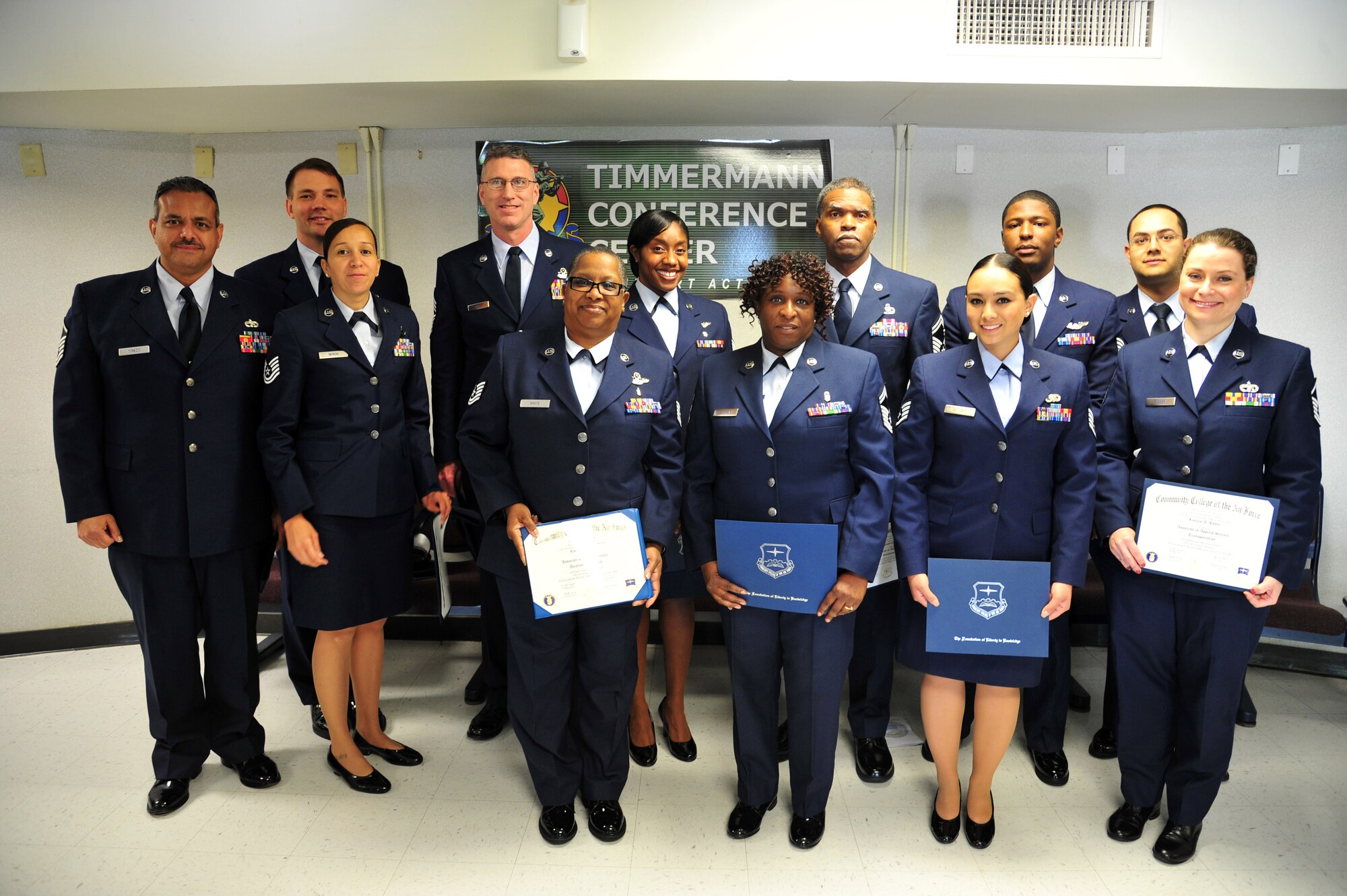 Twelve Air Force reservists received their associates degree from the Community College of the Air Force yesterday during the Spring 2016 commencement ceremony held at the Timmerman Theater here. More than 60 Freedom Wing members earned their degree for the spring session giving the Education Center top tier placement within the Air Force Reserve Command. To view the list of graduates see the article "Education Office churns out CCAF grads" published in April. (U.S. Air Force photo by Master Sgt. Donna T. Jeffries)