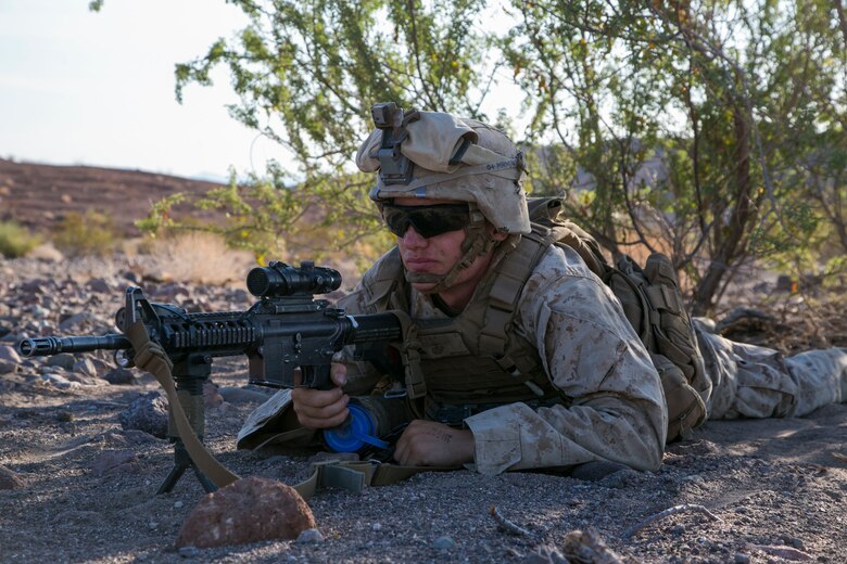 Lance Cpl. Matthew Meyers, rifleman, 3rd Battalion, 2nd Marine Regiment, provides security during a defensive exercise as part of the final exercise of Integrated Training Exercise 3-16 in the Blacktop Training Area aboard Marine Corps Air Ground Combat Center, Twentynine Palms, Calif., June 2, 2016. (Official Marine Corps photo by Lance Cpl. Dave Flores/Released)