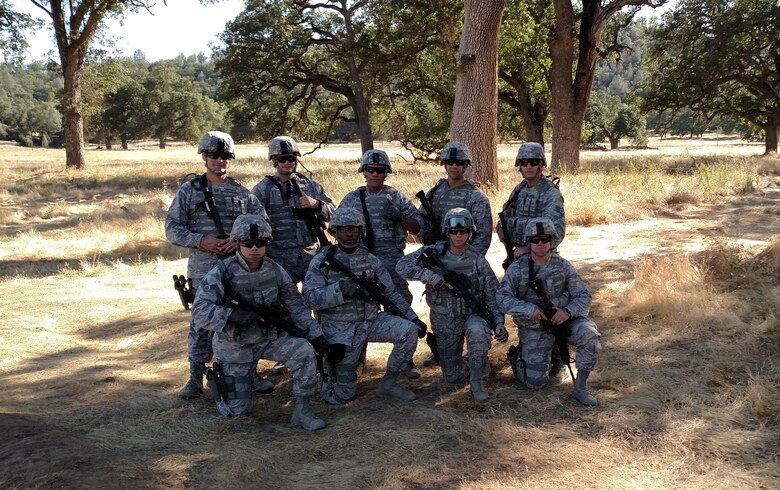 Members of the 926th Security Forces Squadron's Quick Reaction Force pictured at Fort Hunter Liggett, California, during a U.S. Special Operations Command exercise, where they trained with the U.S. Army and U.S Navy SEALS. (Top row, left to right) Master Sgt. Bryant Carpenter, Senior Airman Joseph Kabbani, Senior Airman Robert Quintana-Chavez, Senior Airman Jhovany Romo and Staff Sgt. Benjamin Willard. (Front row, left to right) Senior Airman Errol Fajardo, Senior Airman Davion Cobb, Senior Airman Nathan Senio and Staff Sgt. Zachary Giffin-Pope. (courtesy photo)