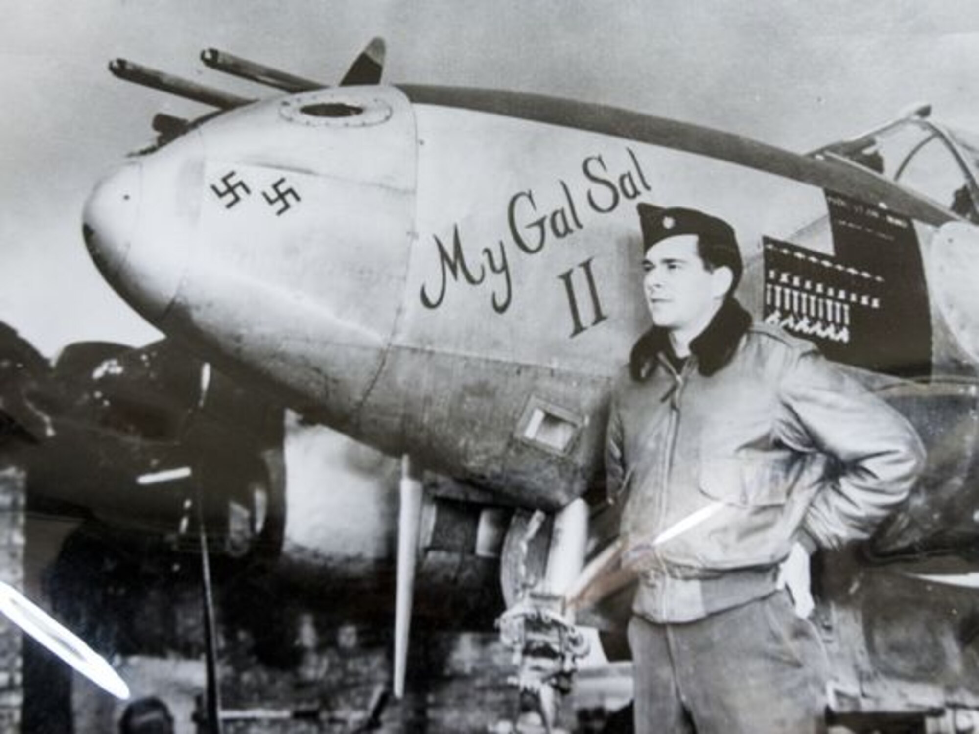 The 460th Operations Group, Detachment 1, Boulder, Colo. won the 2015 Gen. Seth J. McKee Award, which recognizes the best overall Space Warning Squadron in Air Force Space Command that made the most significant contributions in support of the overall space mission. McKee, then a lieutenant colonel, and his P-38 Lightning, named for his wife, during World War II. The two swastikas represent German planes he shot down before D-Day. (Courtesy photo by Pat Shannahan)