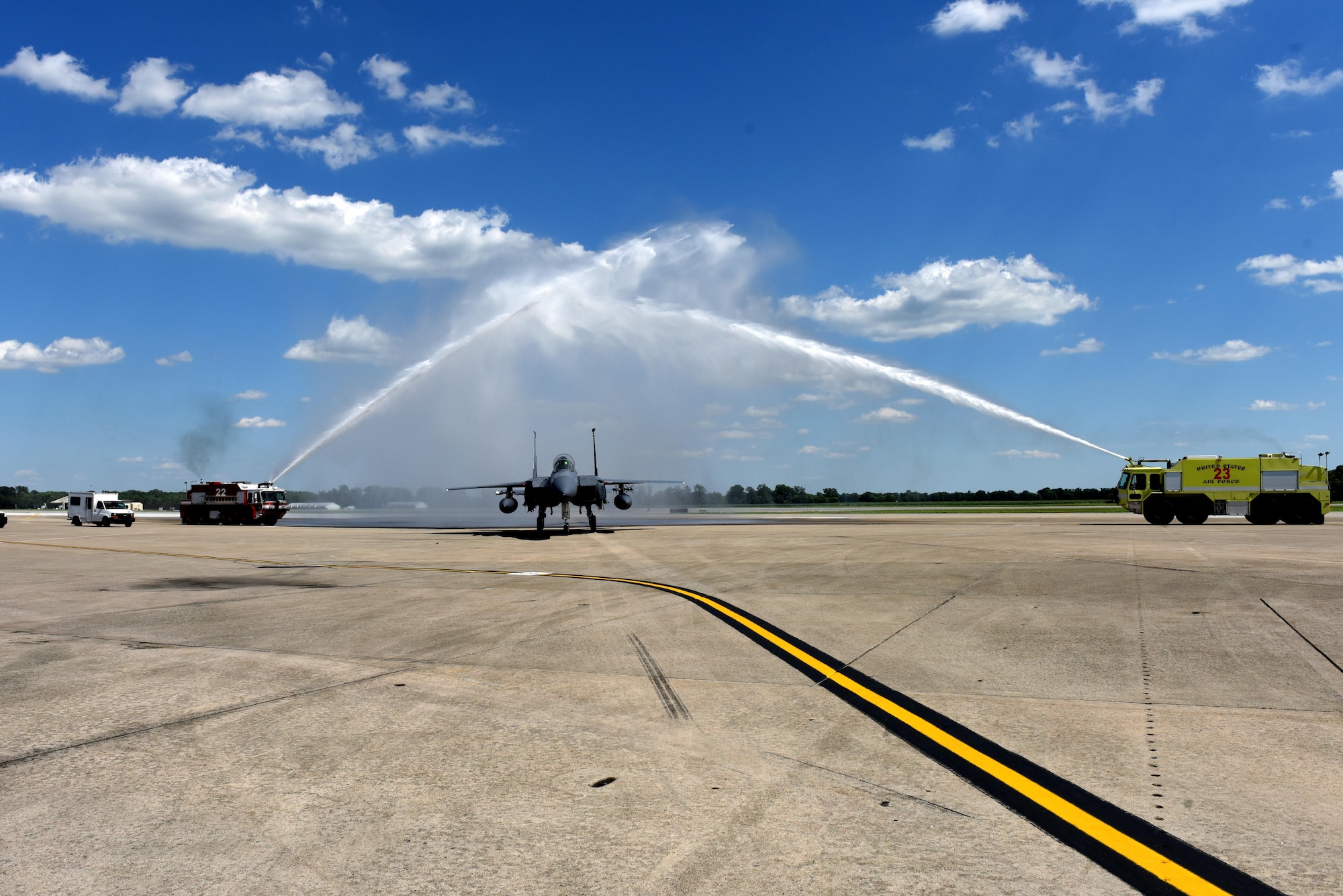 Lt. Col. Nate Hesse, 4th Operations Group deputy commander and pilot, and Col. Brian Afflerbaugh, 4th OG commander and weapons systems officer, taxi under a water arch June 8, 2016, at Seymour Johnson Air Force Base, North Carolina. Afflerbaugh was completing his final mission as group commander. (U.S. Air Force photo/Tech. Sgt. Chuck Broadway)