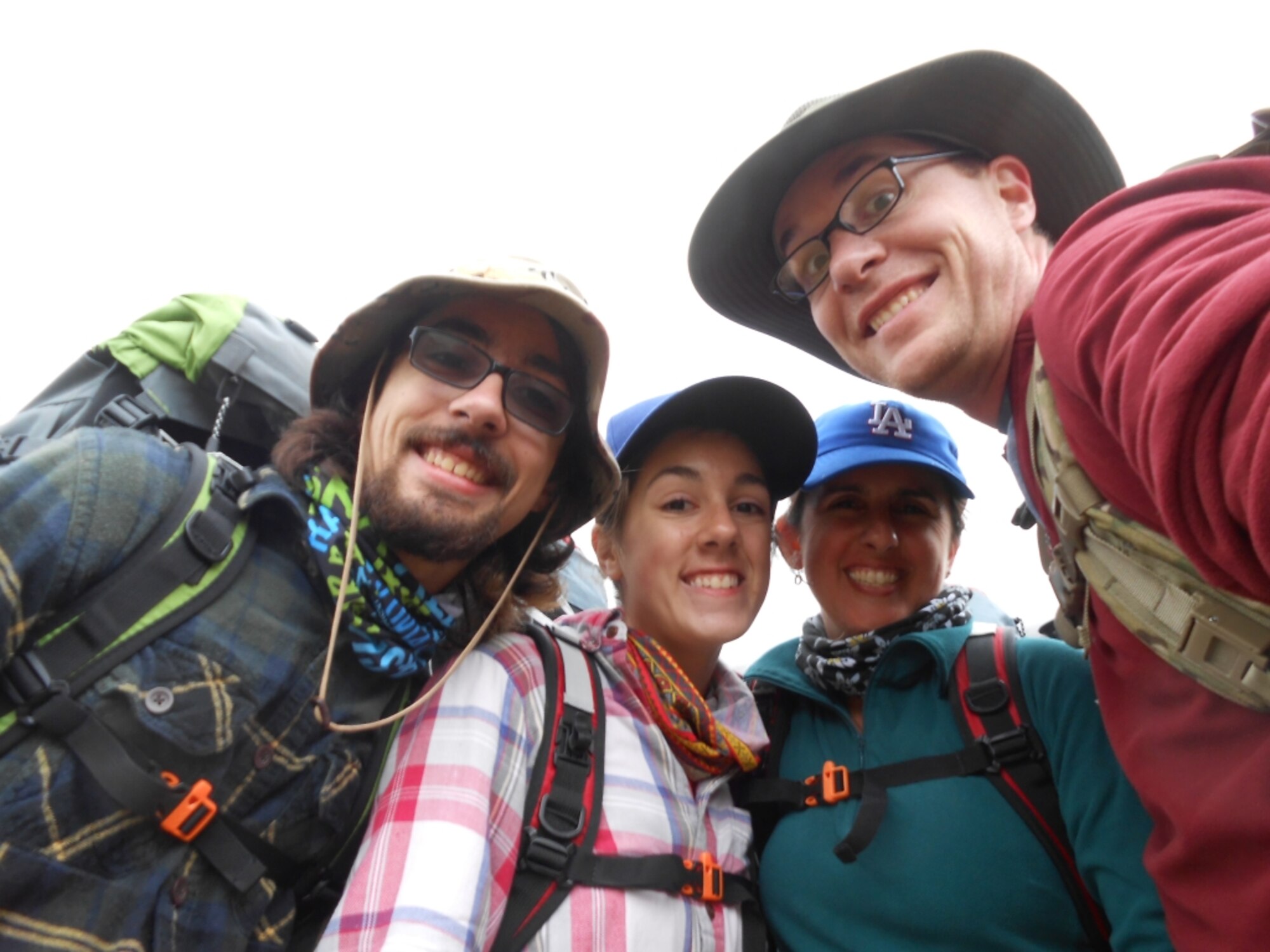 Fiona Pedrick, daughter of Maj. Gabriel Pedrick, 4th Fighter Wing deputy staff judge advocate, takes a family photo during a hiking trip, Aug. 7, 2014, in the Chugach National Forest, Alaska. Pedrick plans to study diplomacy and world affairs at Occidental College in Los Angeles, California. (U.S. Air Force photo by Airman Shawna L. Keyes/Released)   