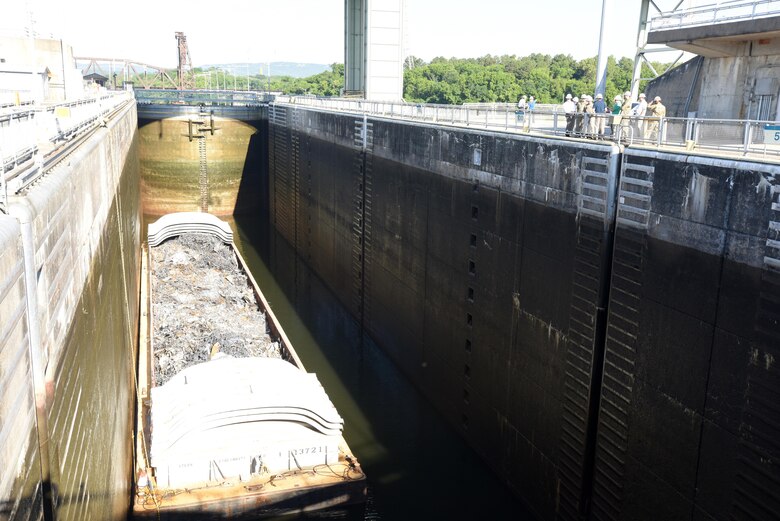 Lt. Gen. Todd T. Semonite, U.S. Army Corps of Engineers commander, sees a barge lock through Chickamauga Lock during a visit to the project in Chattanooga, Tenn., June 7, 2016.  The 60-by-360 foot lock has structural problems resulting from alkali aggregate reaction between the alkali in the cement and the rock aggregate, which results in a physical expansion of concrete structures.  Even with costly advanced maintenance procedures, the concrete expansion threatens the structural integrity of the lock and limits its life span.