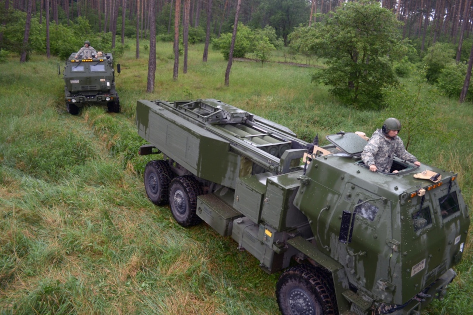High Mobility Artillery Rocket Systems crews of the 5th Battalion, 113th Field Artillery Regiment, North Carolina Army National Guard, travel throughout training areas in Drawsko Pomorski, Poland, as part of Exercise Anakonda 16 June 1, 2016. AN16 is a Polish national exercise that seeks to train, exercise and integrate Polish national command and force structures into an allied, joint and multinational environment. 
