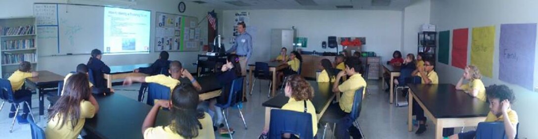 Water Safety Project Manager Dave Swiatek talks to a group of fifth grade students at the Charter School for Applied Technologies to remind them when in the water, wear your life jacket, May 25, 2016.