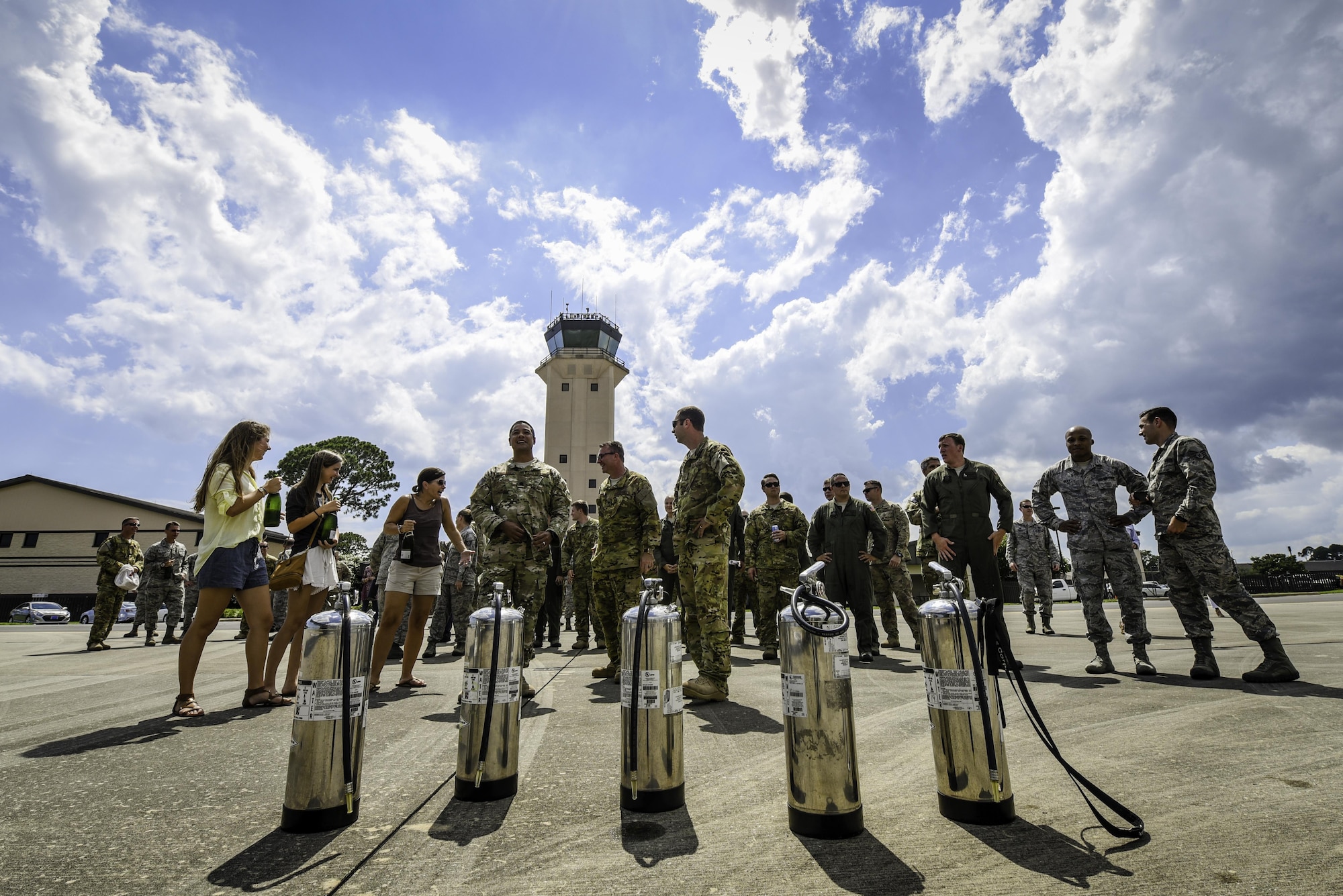 Airmen gather for Col. Sean Farrell’s, commander of the 1st Special Operations Wing, final flight arrival at Hurlburt Field, Fla., June 7, 2016. Final or "fini-flights" are an Air Force tradition dating back to World War II and are held to celebrate an aviator's departure from their unit. (U.S. Air Force photo by Staff Sgt. Christopher Callaway)